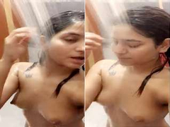 Young and shameless desi girl with a small tatoo sexy poses during shower time