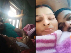 Desi woman is laying in bed with her husband as she is filmed in the XXX