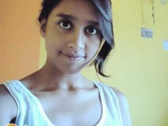 Adorable Desi teen with a cute face and a slender figure films herself XXX