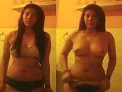 Phenomenal Desi with firm natural breasts is all alone in her bedroom XXX