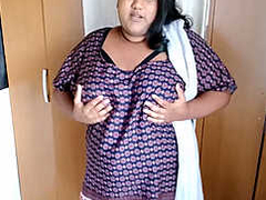 Chubby BBW Desi is pressing her natural boobs for the show while clothed XXX
