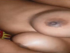 Desi woman from a random village in India is pressing her big natural XXX tits