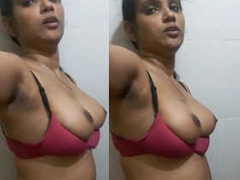 Curvy Desi woman with juicy boobs is fingering herself in the room before XXX